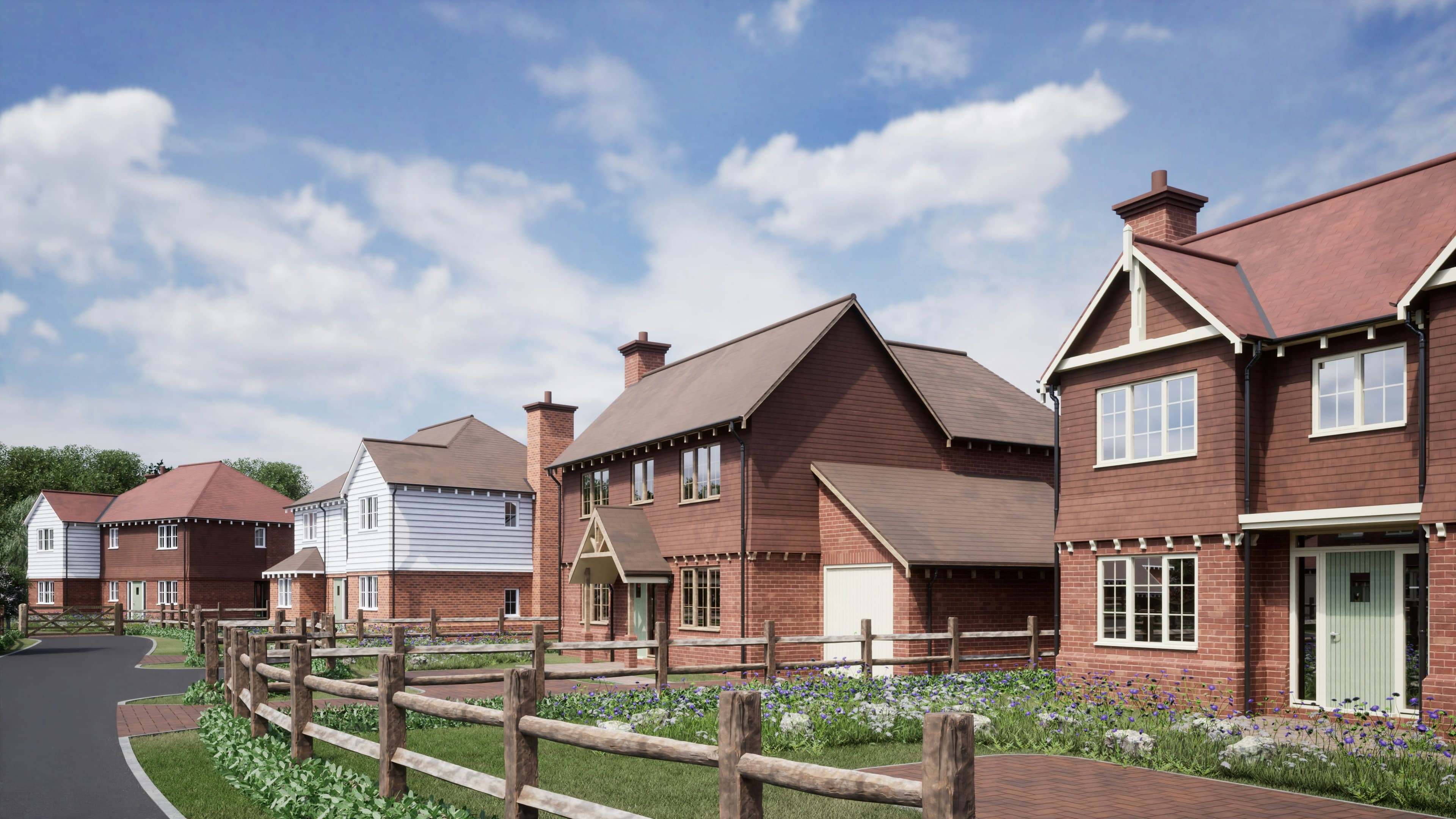 A row of new brick homes beneath a bright blue sky